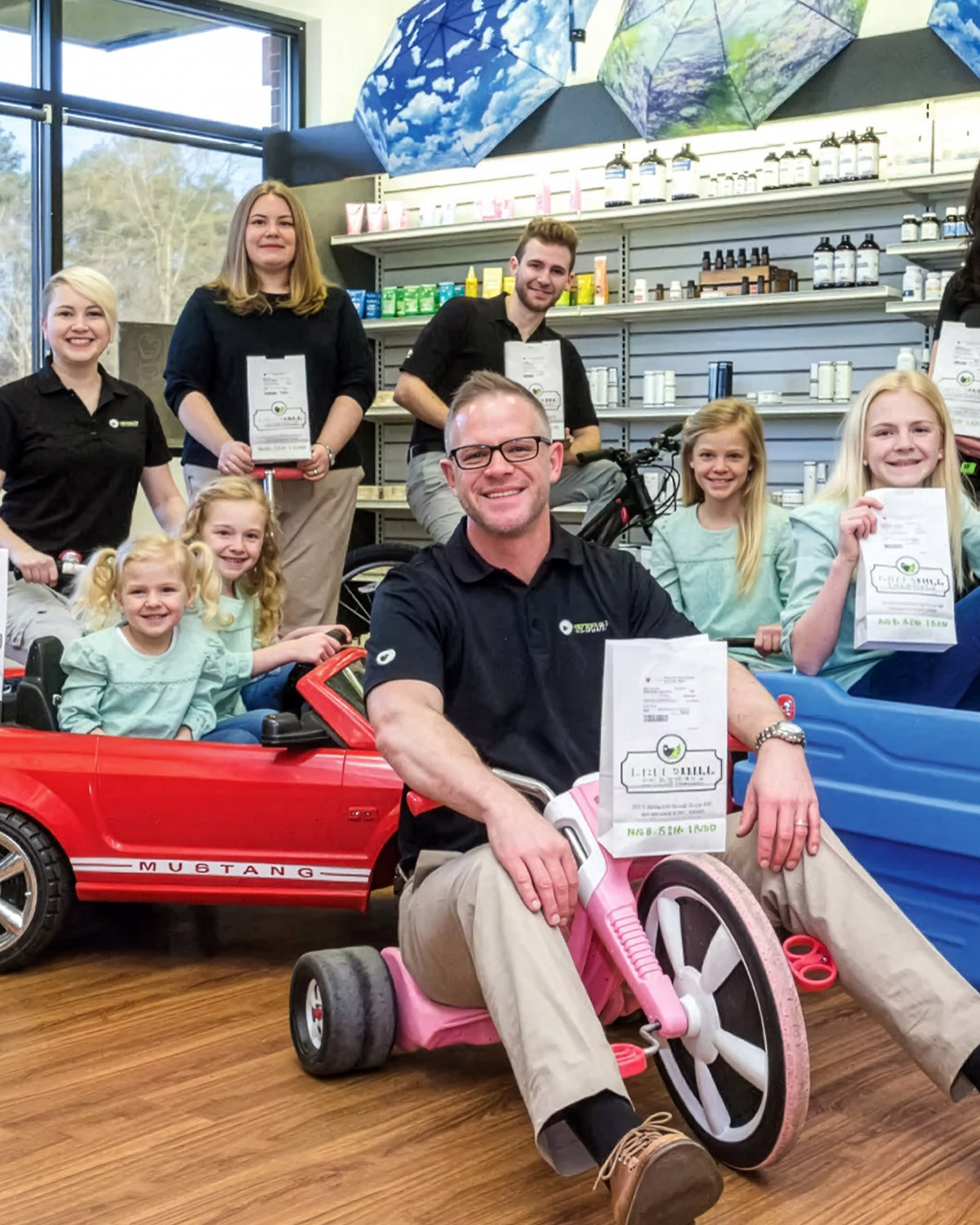 Tommy and the Greenhill Pharmacy team in the pharmacy showroom